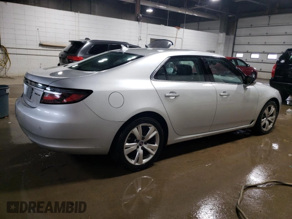 2011 Saab 9-5 Turbo4 z VIN YS3GN4AR5B4007387, wystawiony jako Copart lot #57578455 z przebiegiem 278 323 mil mil oraz Tytuł czysty. Historia ofert i sprzedaży dostępna na DreamBid. Obrazek 3.