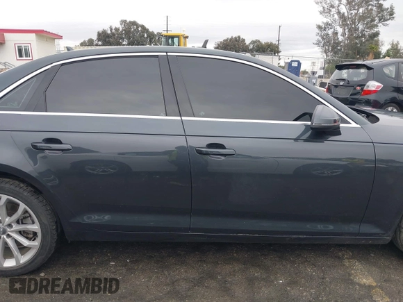 2019 Audi A4 Premium z VIN WAUGMAF44KA060327, wystawiony jako IAAI lot #41757099 z przebiegiem 52 110 mil mil oraz . Historia ofert i sprzedaży dostępna na DreamBid. Obrazek 14.