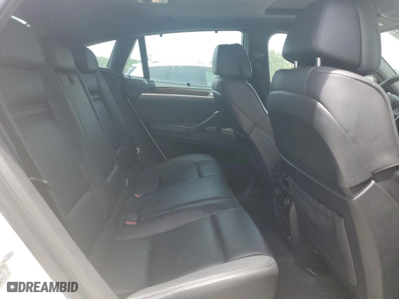 2014 BMW X6 xDrive35i with VIN 5UXFG2C53E0C44534, listed as a Copart auction lot 56518074 with 141,924 mi miles and Salvage Title. Bid and sale history available at carsss.com. Image 11.