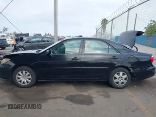2006 Toyota Camry STD with VIN 4T1BE32K16U165708, listed as a IAAI auction lot 42138137 with 156,438 mi miles and . Bid and sale history available at DreamBid. Image 14.