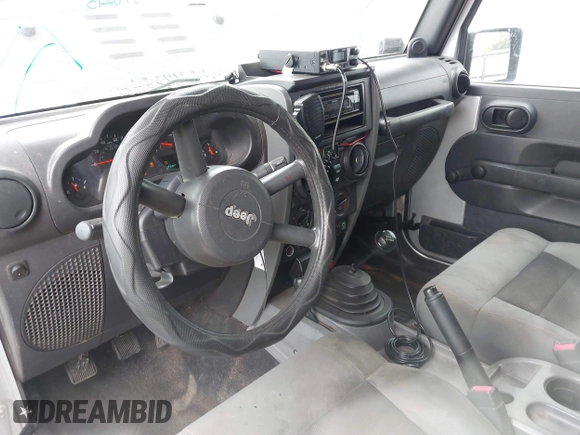 2007 Jeep Wrangler X with VIN 1J4FA24117L142513, listed as a IAAI auction lot 42314284 with 70,213 mi miles and . Bid and sale history available at DreamBid. Image 5.