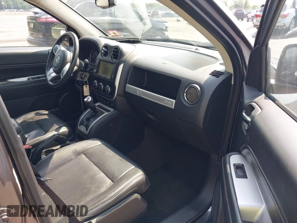 2017 Jeep Compass Latitude with VIN 1C4NJDEB4HD114026, listed as a IAAI auction lot 42449519 with 97,877 mi miles and . Bid and sale history available at DreamBid. Image 5.