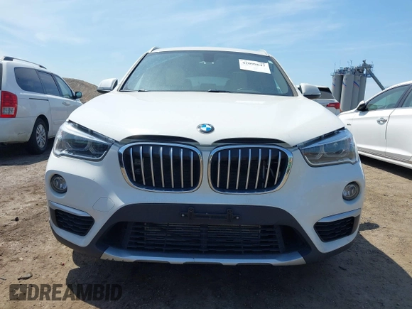 2018 BMW X1 xDrive28i with VIN WBXHT3C39J5F91912, listed as a IAAI auction lot 42099647 with 79,023 mi miles and . Bid and sale history available at DreamBid. Image 12.