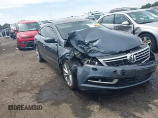 2013 Volkswagen CC Executive z VIN WVWGU7AN8DE520610, wystawiony jako IAAI lot #42278719 z przebiegiem 197 905 mil mil oraz . Historia ofert i sprzedaży dostępna na DreamBid. Obrazek 1.