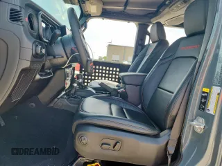 2024 Jeep Wrangler Rubicon X with VIN 1C4RJXFGXRW247781, listed as a Copart auction lot 64393745 with 2,661 mi miles and Salvage title. Bid and sale history available at DreamBid. Image 7.