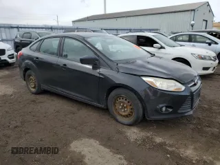 2012 Ford Focus SE with VIN 1FAHP3F24CL458433, listed as a Copart auction lot 48610995 with 283,408 mi miles and Clean Title. Bid and sale history available at DreamBid. Image 4.