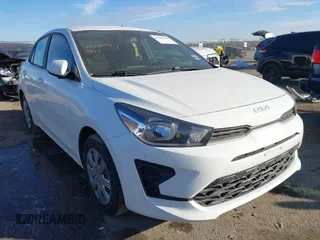 2023 Kia Rio S z VIN 3KPA24AD3PE530066, wystawiony jako IAAI lot #41301158 z przebiegiem 33 614 mil mil oraz . Historia ofert i sprzedaży dostępna na DreamBid. Obrazek 1.