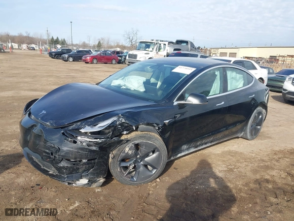 2019 Tesla Model 3 Long Range with VIN 5YJ3E1EB5KF414748, listed as a IAAI auction lot 41778914 with 0 mi miles. Bid and sale history available at carsss.com. Image 2.