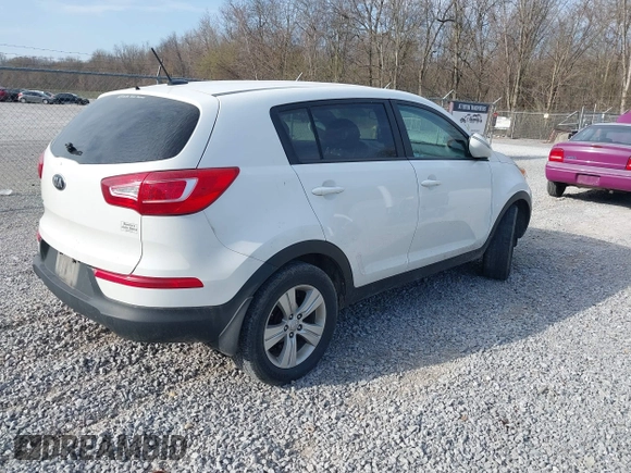 2013 Kia Sportage LX with VIN KNDPB3A21D7533188, listed as a IAAI auction lot 41789723 with 238,885 mi miles and . Bid and sale history available at DreamBid. Image 4.