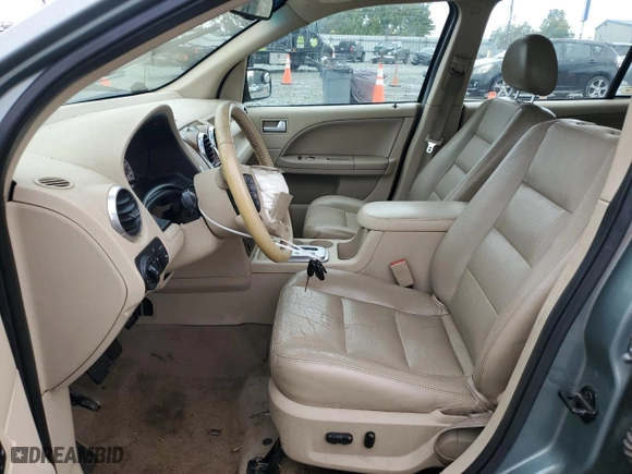 2006 Ford Freestyle Limited with VIN 1FMDK06136GA10335, listed as a Copart auction lot 72193264 with 218,418 mi miles and Salvage Title. Bid and sale history available at carsss.com. Image 7.