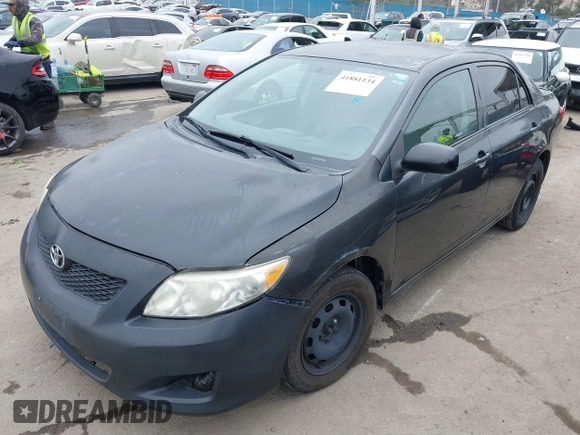 2009 Toyota Corolla with VIN 1NXBU40E49Z165082, listed as a IAAI auction lot 41881134 with 261,282 mi miles. Bid and sale history available at carsss.com. Image 2.