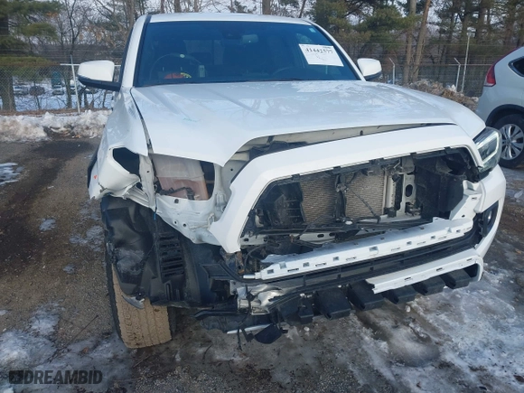 2023 Toyota Tacoma 4WD SR with VIN 3TMCZ5ANXPM599135, listed as a IAAI auction lot 41442577 with 26,901 mi miles. Bid and sale history available at carsss.com. Image 6.