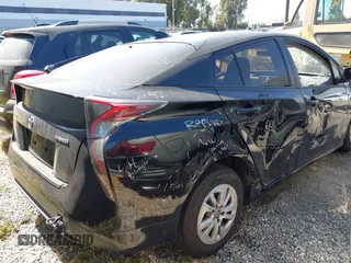 2016 Toyota Prius Two z VIN JTDKBRFU5G3014163, wystawiony jako IAAI lot #42475556 z przebiegiem 157 873 mil mil oraz . Historia ofert i sprzedaży dostępna na DreamBid. Obrazek 4.