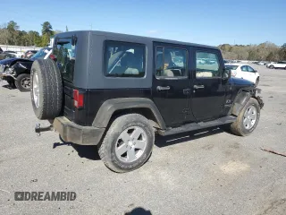 2009 Jeep Wrangler Unlimited X with VIN 1J4GA391X9L788932, listed as a Copart auction lot 49004925 with 105,674 mi miles and Salvage Title. Bid and sale history available at carsss.com. Image 3.