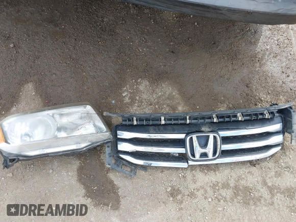 2012 Honda Pilot EX-L with VIN 5FNYF4H54CB057249, listed as a IAAI auction lot 41876322 with 180,641 mi miles and . Bid and sale history available at DreamBid. Image 12.