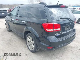 2014 Dodge Journey Limited with VIN 3C4PDDDG6ET118355, listed as a IAAI auction lot 42030856 with 164,740 mi miles and . Bid and sale history available at carsss.com. Image 3.