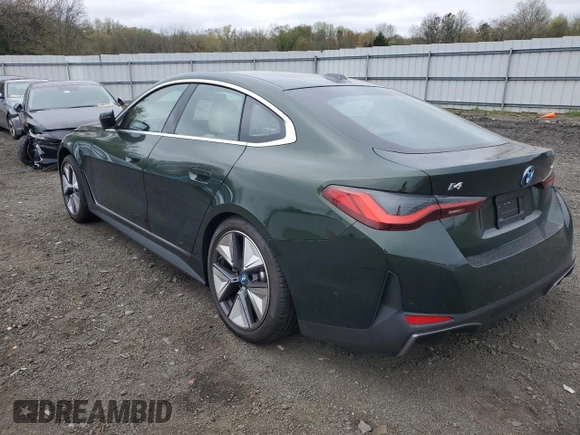 2023 BMW i4 eDrive35 with VIN WBY43AW05PFR41603, listed as a Copart auction lot 51033704 with 4,997 mi miles. Bid and sale history available at carsss.com. Image 2.