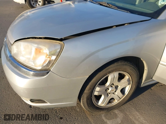 2004 Chevrolet Malibu Maxx LT z VIN 1G1ZU64854F172471, wystawiony jako IAAI lot #41307805 z przebiegiem 138 744 mil mil oraz . Historia ofert i sprzedaży dostępna na DreamBid. Obrazek 6.