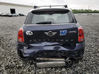 2015 MINI Countryman S z VIN WMWZC5C59FWP43388, wystawiony jako Copart lot #56876375 z przebiegiem 58 952 mil mil oraz Szkody całkowita. Historia ofert i sprzedaży dostępna na DreamBid. Obrazek 6.