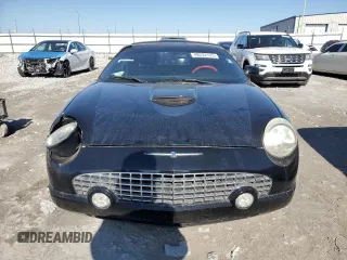 2004 Ford Thunderbird Deluxe z VIN 1FAHP60A24Y101788, wystawiony jako Copart lot #48224125 z przebiegiem 53 383 mil mil oraz Szkoda całkowita • Salvage title. Historia ofert i sprzedaży dostępna na DreamBid. Obrazek 5.