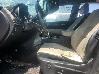 2016 Jeep Grand Cherokee Limited 75th Anniversary with VIN 1C4RJEBG4GC423829, listed as a Copart auction lot 53019705 with 197,353 mi miles and Salvage title. Bid and sale history available at DreamBid. Image 7.