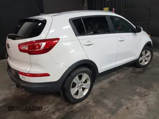 2012 Kia Sportage LX with VIN KNDPB3A26C7269092, listed as a IAAI auction lot 41892059 with 149,000 mi miles. Bid and sale history available at carsss.com. Image 4.