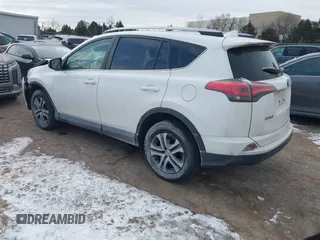 2017 Toyota RAV4 LE with VIN JTMBFREV4HJ170495, listed as a IAAI auction lot 41619488 with 132,751 mi miles and . Bid and sale history available at DreamBid. Image 3.