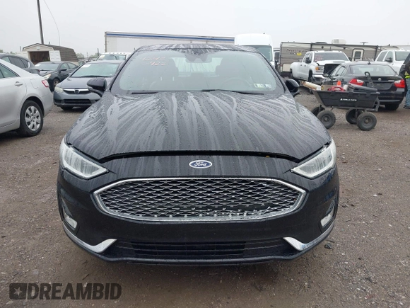 2019 Ford Fusion Titanium with VIN 3FA6P0D92KR125864, listed as a IAAI auction lot 42425422 with 109,340 mi miles and . Bid and sale history available at DreamBid. Image 12.