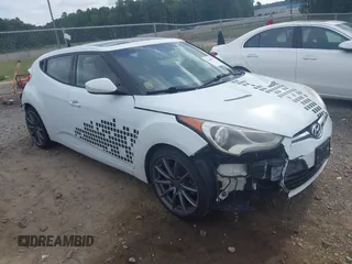2013 Hyundai Veloster w/Gray Int with VIN KMHTC6AD3DU131703, listed as a IAAI auction lot 42468831 with 188,513 mi miles and . Bid and sale history available at DreamBid. Image 1.