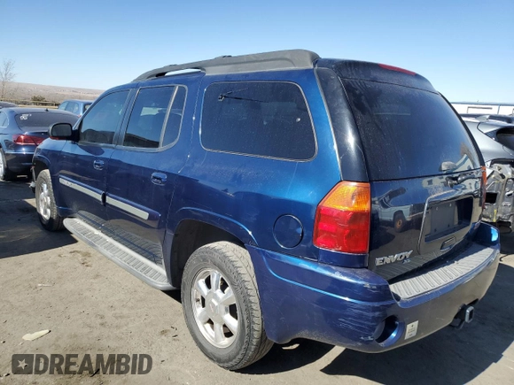 2003 GMC Envoy SLT z VIN 1GKET16S436169701, wystawiony jako Copart lot #44390805 z przebiegiem 168 236 mil mil oraz Szkoda całkowita • Salvage title. Historia ofert i sprzedaży dostępna na DreamBid. Obrazek 2.