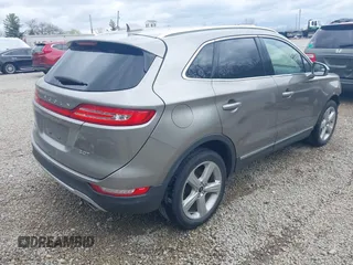 2017 Lincoln MKC Premiere with VIN 5LMCJ1C93HUL27435, listed as a IAAI auction lot 42016623 with 77,701 mi miles and . Bid and sale history available at DreamBid. Image 4.