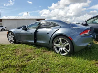 2012 Fisker Karma EcoSport z VIN YH4K14AA3CA001524, wystawiony jako Copart lot #74501534 z przebiegiem 15 969 mil mil oraz Nie do naprawy. Historia ofert i sprzedaży dostępna na DreamBid. Obrazek 2.