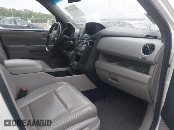 2013 Honda Pilot Touring with VIN 5FNYF4H96DB016044, listed as a IAAI auction lot 42314590 with 183,913 mi miles and . Bid and sale history available at DreamBid. Image 5.