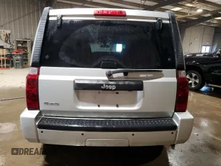 2009 Jeep Commander Sport z VIN 1J8HG48K09C526337, wystawiony jako Copart lot #89026135 z przebiegiem 194 514 mil mil oraz Szkoda całkowita • Salvage title. Historia ofert i sprzedaży dostępna na DreamBid. Obrazek 6.