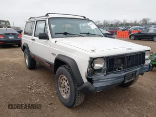 1996 Jeep Cherokee Sport with VIN 1J4FJ67S4TL224743, listed as a IAAI auction lot 42083533 with 253,847 mi miles. Bid and sale history available at carsss.com. Image 1.