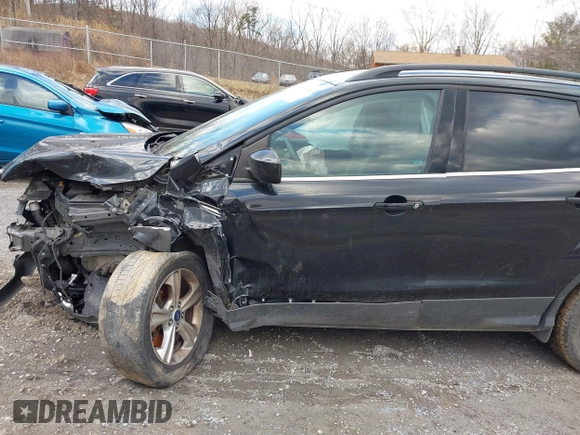 2014 Ford Escape SE with VIN 1FMCU9G91EUB05605, listed as a IAAI auction lot 41479240 with 152,510 mi miles. Bid and sale history available at carsss.com. Image 12.