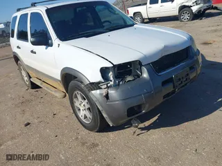 2004 Ford Escape XLT with VIN 1FMYU93174KA45992, listed as a IAAI auction lot 41169340 with 308,987 mi miles. Bid and sale history available at carsss.com. Image 13.