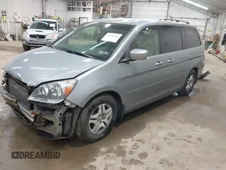 2006 Honda Odyssey EX with VIN 5FNRL38446B044231, listed as a IAAI auction lot 42080586 with 211,908 mi miles. Bid and sale history available at carsss.com. Image 17.