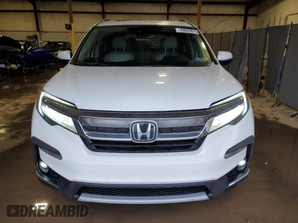 2020 Honda Pilot Touring 8-Passenger with VIN 5FNYF6H98LB058712, listed as a Copart auction lot 43622815 with 81,854 mi miles and Salvage Title. Bid and sale history available at DreamBid. Image 5.