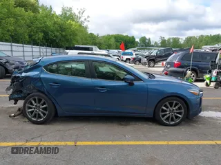2018 Mazda 3 Touring z VIN 3MZBN1L38JM235604, wystawiony jako IAAI lot #42333995 z przebiegiem 69 541 mil mil oraz . Historia ofert i sprzedaży dostępna na DreamBid. Obrazek 13.