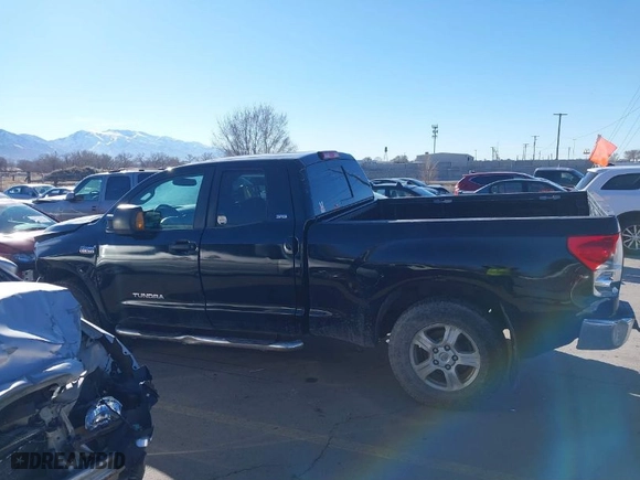 2007 Toyota Tundra SR5 with VIN 5TFBV54127X011965, listed as a IAAI auction lot 41670795 with 156,864 mi miles. Bid and sale history available at carsss.com. Image 14.
