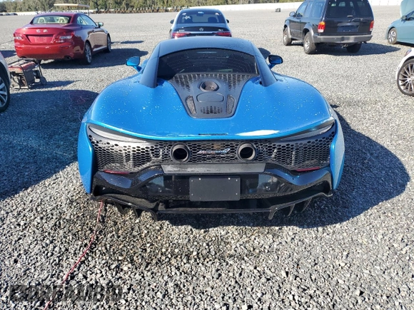 2023 McLaren Artura z VIN SBM16AEA2PW001739, wystawiony jako Copart lot #81910384 z przebiegiem 3871 mil mil oraz Szkody całkowita. Historia ofert i sprzedaży dostępna na DreamBid. Obrazek 6.