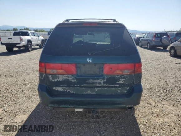 2000 Honda Odyssey EX z VIN 2HKRL1867YH587616, wystawiony jako Copart lot #57258795 z przebiegiem 219 999 mil mil oraz Szkoda całkowita • Salvage title. Historia ofert i sprzedaży dostępna na DreamBid. Obrazek 6.