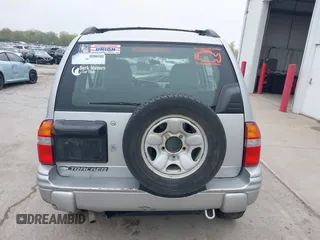 2001 Chevrolet Tracker LT z VIN 2CNBJ634916959876, wystawiony jako IAAI lot #42166992 z przebiegiem 97 878 mil mil oraz . Historia ofert i sprzedaży dostępna na DreamBid. Obrazek 17.