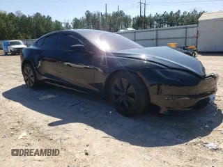 2023 Tesla Model S with VIN 5YJSA1E59PF526333, listed as a Copart auction lot 50607085 with Not provided miles and Salvage title. Bid and sale history available at DreamBid. Image 4.