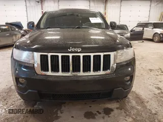 2012 Jeep Grand Cherokee Laredo with VIN 1C4RJFAT1CC225479, listed as a IAAI auction lot 41709911 with 227,150 mi miles. Bid and sale history available at carsss.com. Image 12.