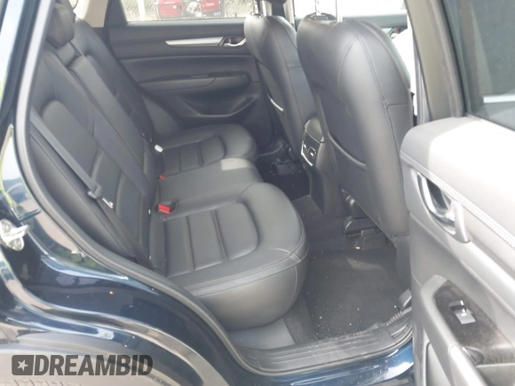 2021 Mazda CX-5 Touring z VIN JM3KFBCMXM0389857, wystawiony jako IAAI lot #42309650 z przebiegiem 49 938 mil mil oraz . Historia ofert i sprzedaży dostępna na DreamBid. Obrazek 8.