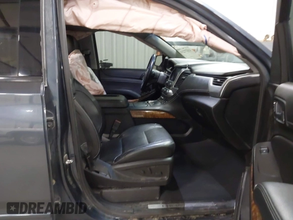 2019 Chevrolet Suburban Premier with VIN 1GNSKJKJ8KR169252, listed as a IAAI auction lot 41472231 with 95,266 mi miles and . Bid and sale history available at DreamBid. Image 5.
