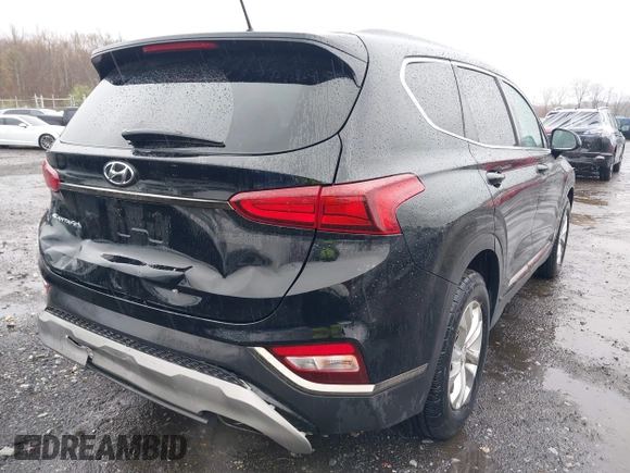 2019 Hyundai Santa Fe SE with VIN 5NMS23AD8KH008680, listed as a IAAI auction lot 42023218 with 67,745 mi miles and . Bid and sale history available at DreamBid. Image 6.