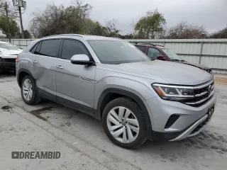 2022 Volkswagen Atlas SE with VIN 1V2WE2CAXNC209665, listed as a Copart auction lot 87189974 with 35,521 mi miles and Salvage title. Bid and sale history available at DreamBid. Image 4.